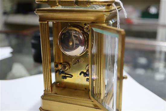 A late 19th century French bass cased eight day striking carriage clock 12cm high